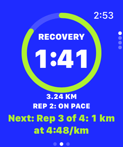 Squall on Apple Watch: a cobalt recovery face, a lime ring running down around 1:41, 3.24 km, rep 2 on pace, and next: rep 3 of 4, 1 km at 4:48 per km.